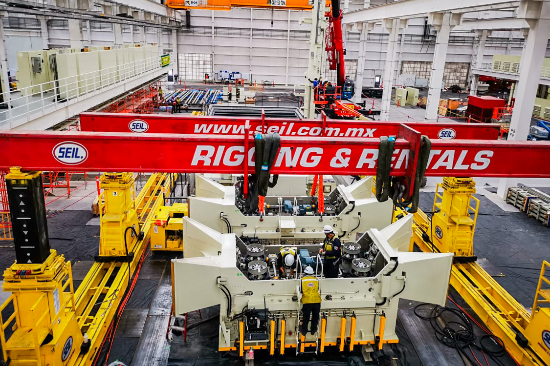 Slide machinery assembly maneuver for 800 ton presses.